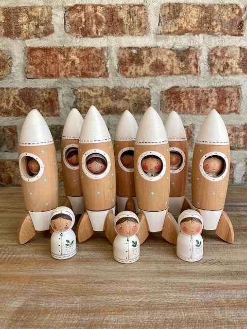 Gnezdo Rocketship with Astronaut toy 