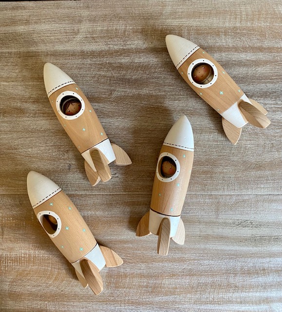 Gnezdo Rocketship with Astronaut toy 